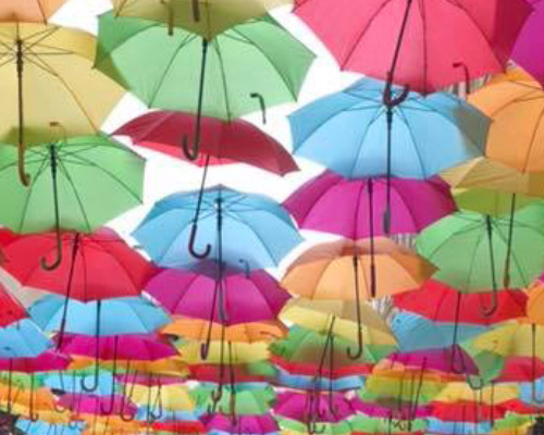 multiple umbrellas opened bright colors